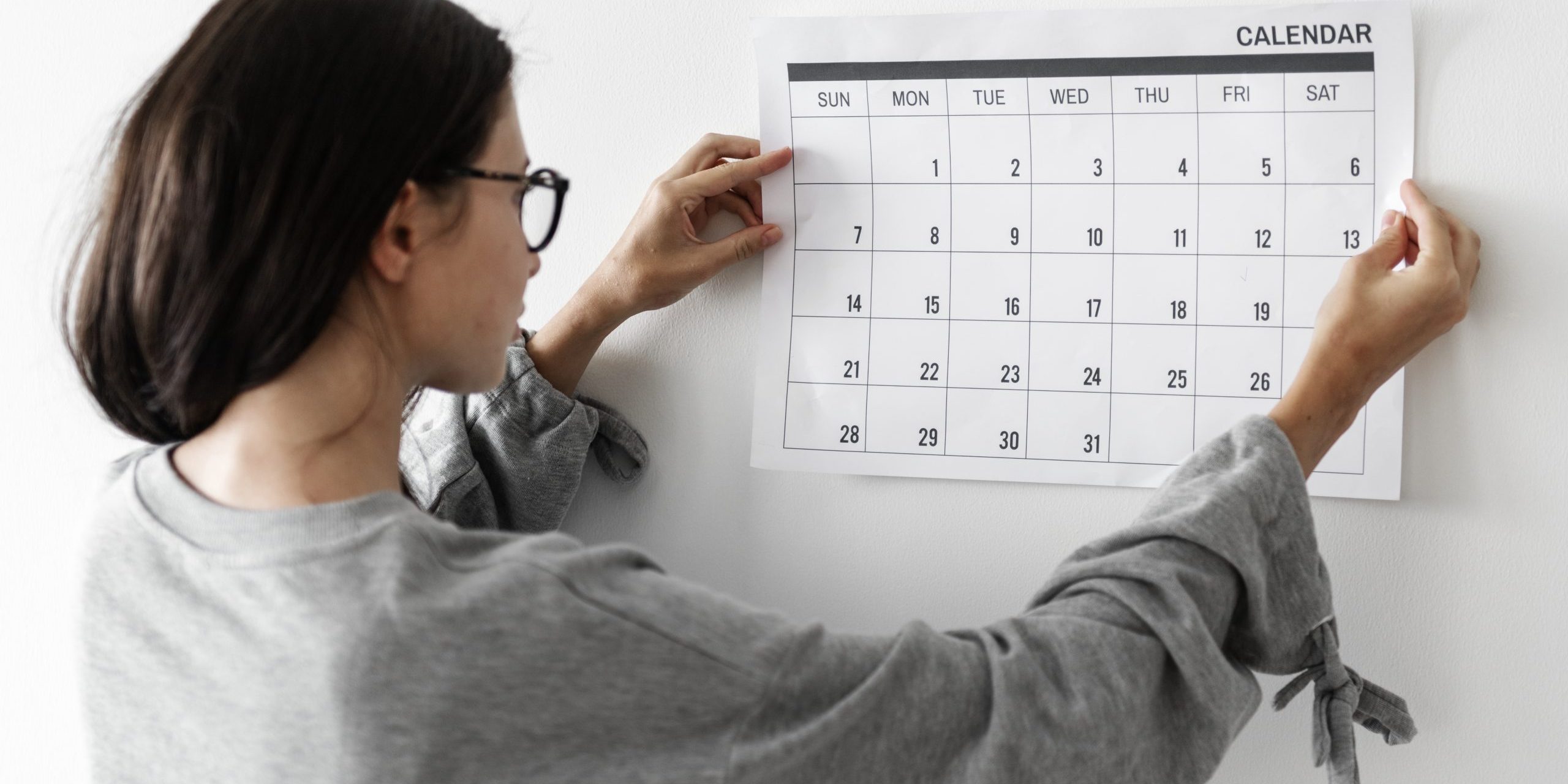 Woman checking the calendar